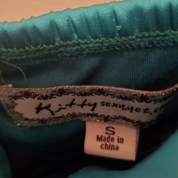 Emerald green strapless dress with a hint of blue.  Size is Small - Picture 4 of 4